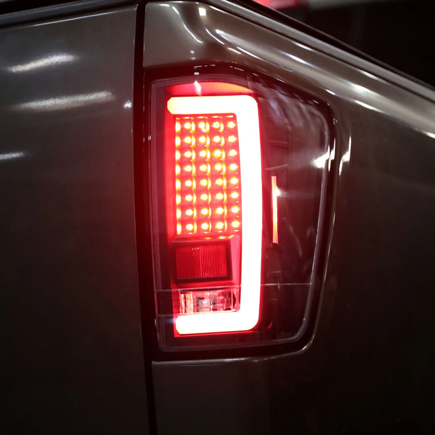 2004-2015 Nissan Titan LED Tail Lights with Red LED Tube Matte Black/Clear - Image 10